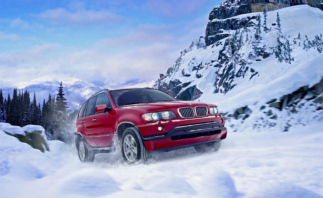 BMW X5 Snow Covered Mountain Road 